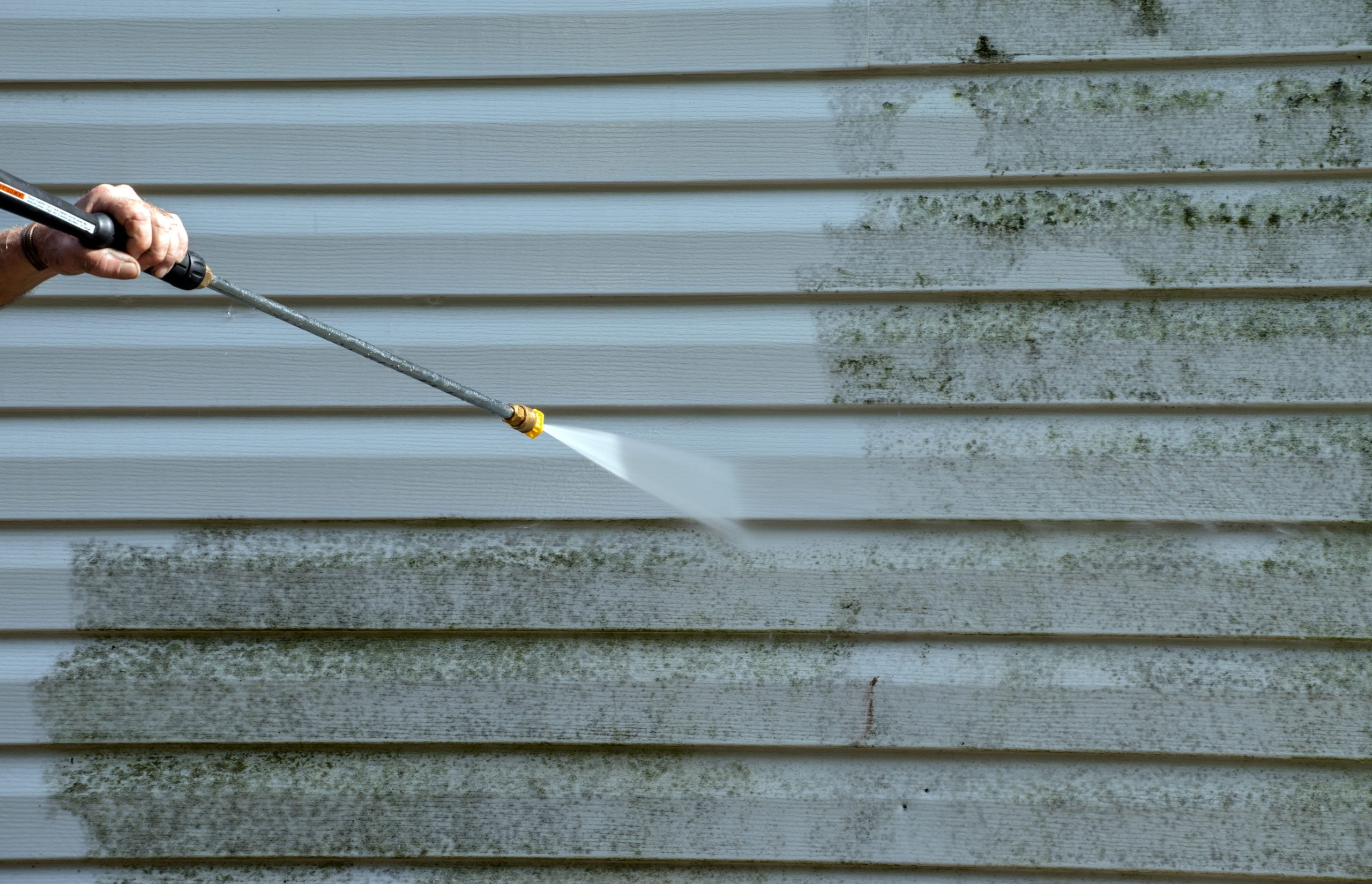 Siding Cleaning Exterior cleaning work in progress Siding Cleaning